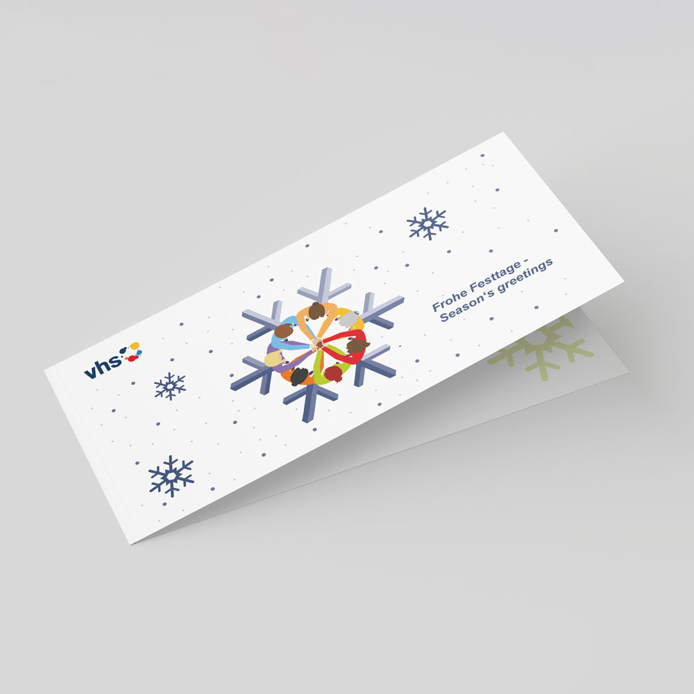 seasons_greetings_menschenkreis_dinlang1 Weihnachtskarte "Schneeflocken"